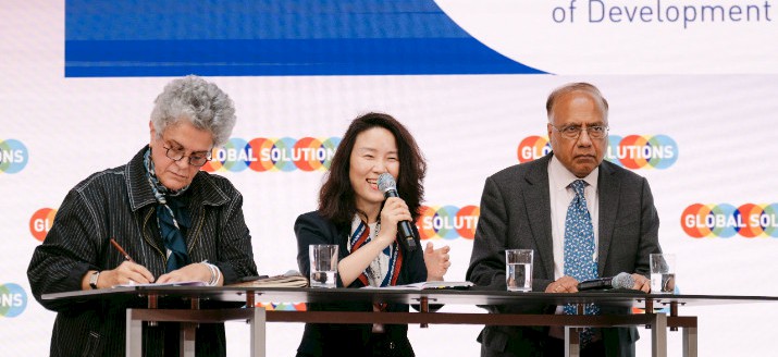 Panel "From Aid to Development Approach", with Prof. Xiuli Xu pictured in the middle